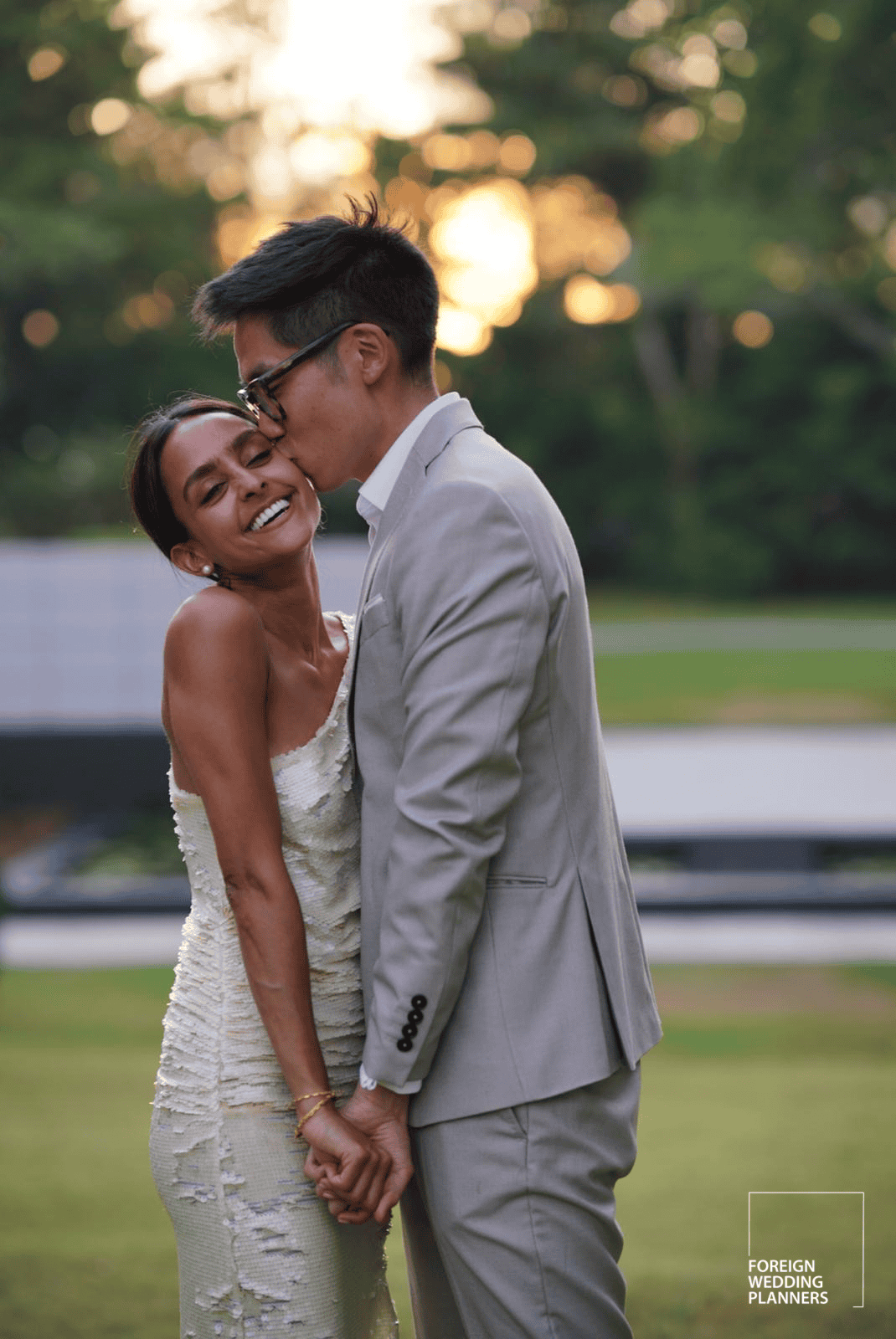 a man and woman kissing
Indian Wedding Guide 2025:  Many weddings are now embracing an unplugged approach. Image courtesy: Foreign Wedding Planners, Indian wedding