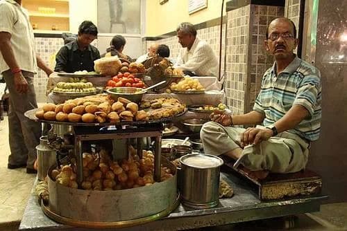 Chaat is Indian street food at its spicy tangy best: Deena chat bhandar in Varanasi, India courtesy :Vivekdidwania1976 via Wikimedia Commons