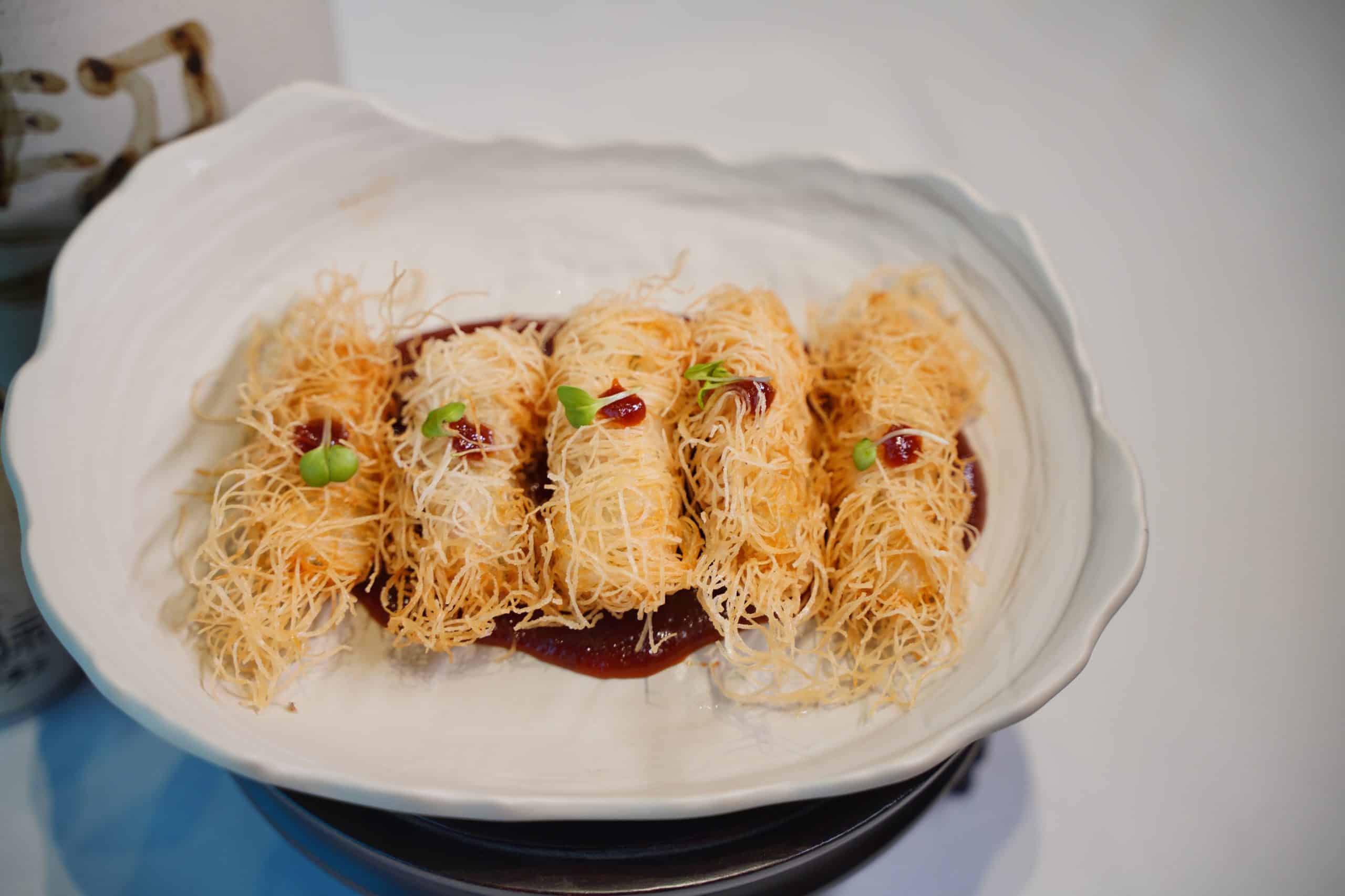 Kataifi Kaffir Lime Prawn with Pineapple Chili Sauce, capturing NORI’s philosophy: inventive yet rooted in classic techniques.