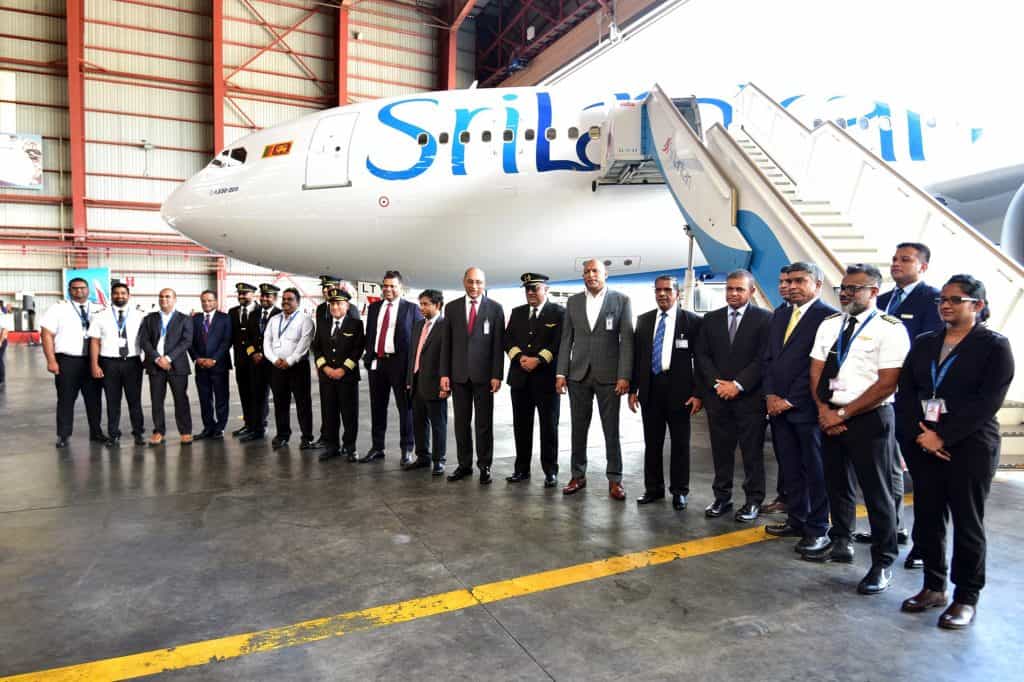 Directors of the Board and members of SriLankan Airlines’ senior management team pose alongside the operating crew who flew the aircraft from France to Colombo