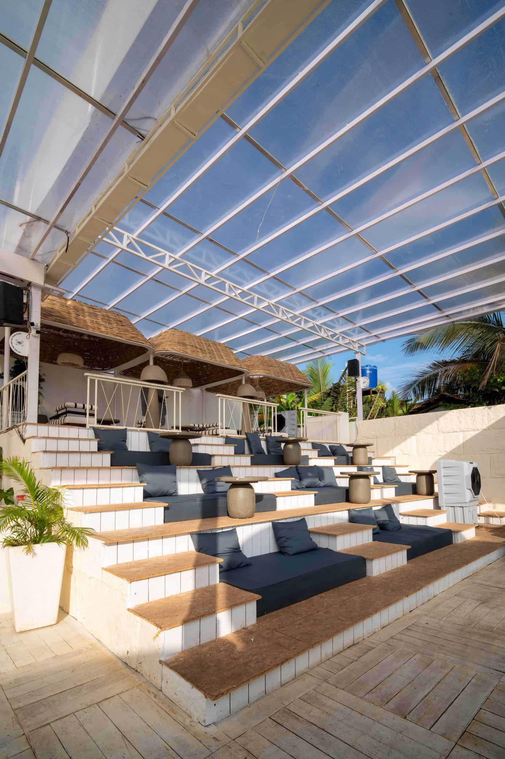 The design leans toward earthy tones and minimalist structures