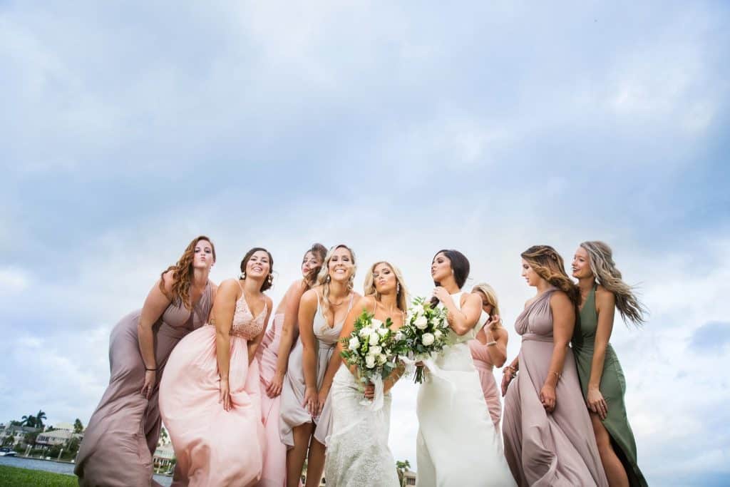 Bridesmaids and family members wear couture dresses 
