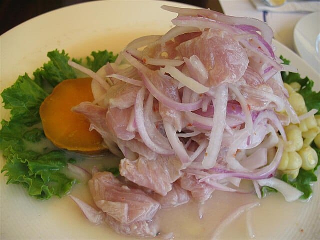 A dish of raw fish slices with lime and chilli that can be found at Lima, Peru. This is the Peruvian version of "sashimi". Image Courtesy: ProjectManhattan, Wikimedia