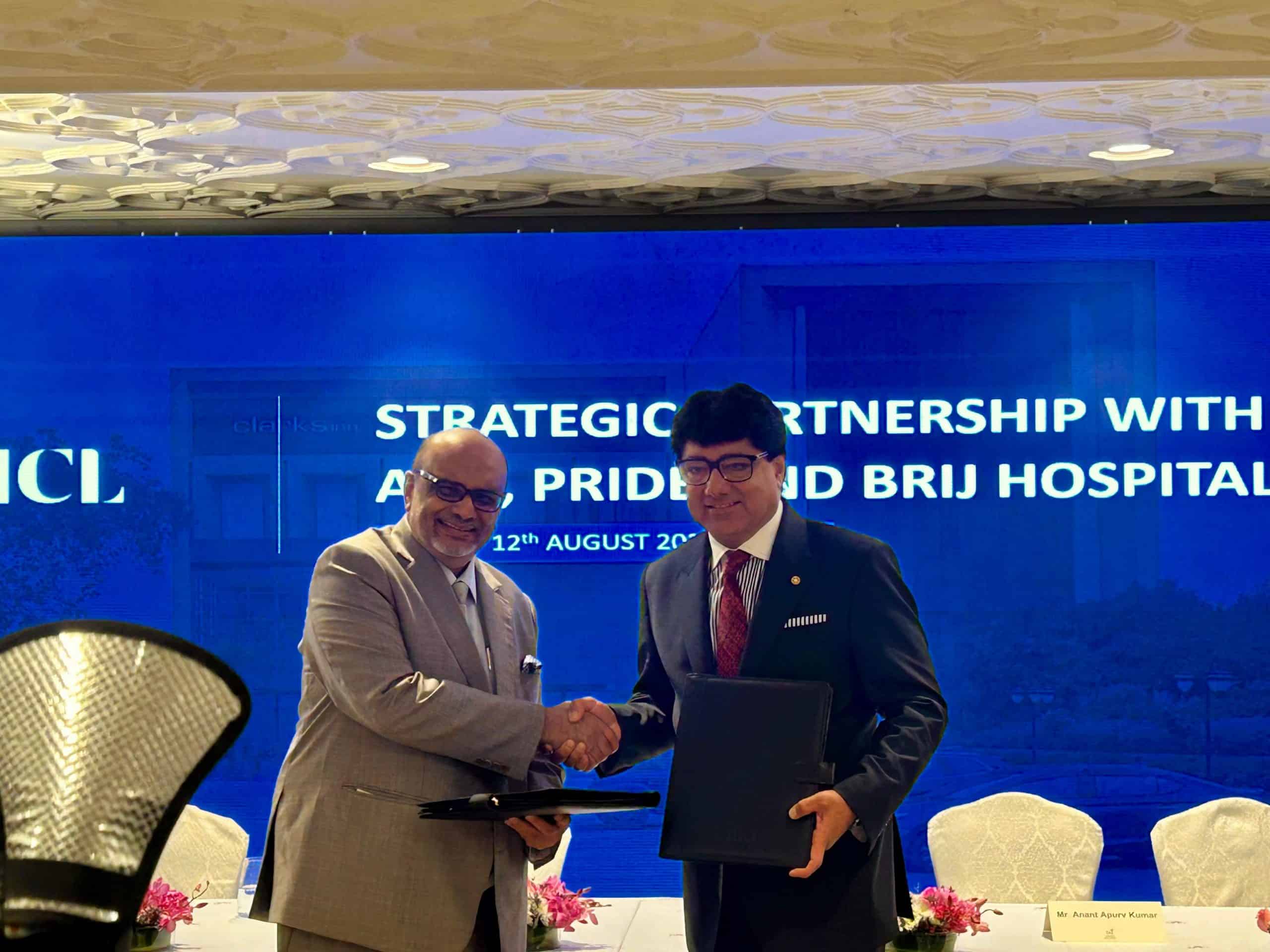 Anoop Kumar Chairman, Clarks hotels and resort resorts with Puneet Chhatwal, Chairman, FAITH