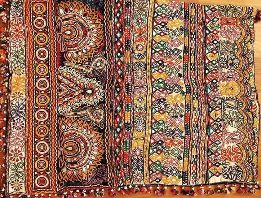  Influenced by nomadic heritage and Central Asian trade, Kutch embroidery thrives on vivid contrasts and intricate embellishment. Image courtesy: Jainmishra  via Wikimedia Commons