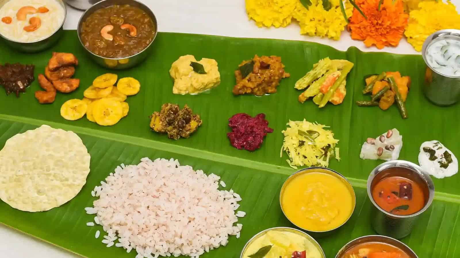 The sadya, which is the Onam feast. Served on banana leaf, it features a colourful array of dishes besides the pappadam and other fries—all placed in specific slots. The rice, which will reappear across the course, will have its share mixed with lentil curry (parippu), followed by sambar and rasam besides dishes of one’s choice, concluding with the sweet pudding called payasam.