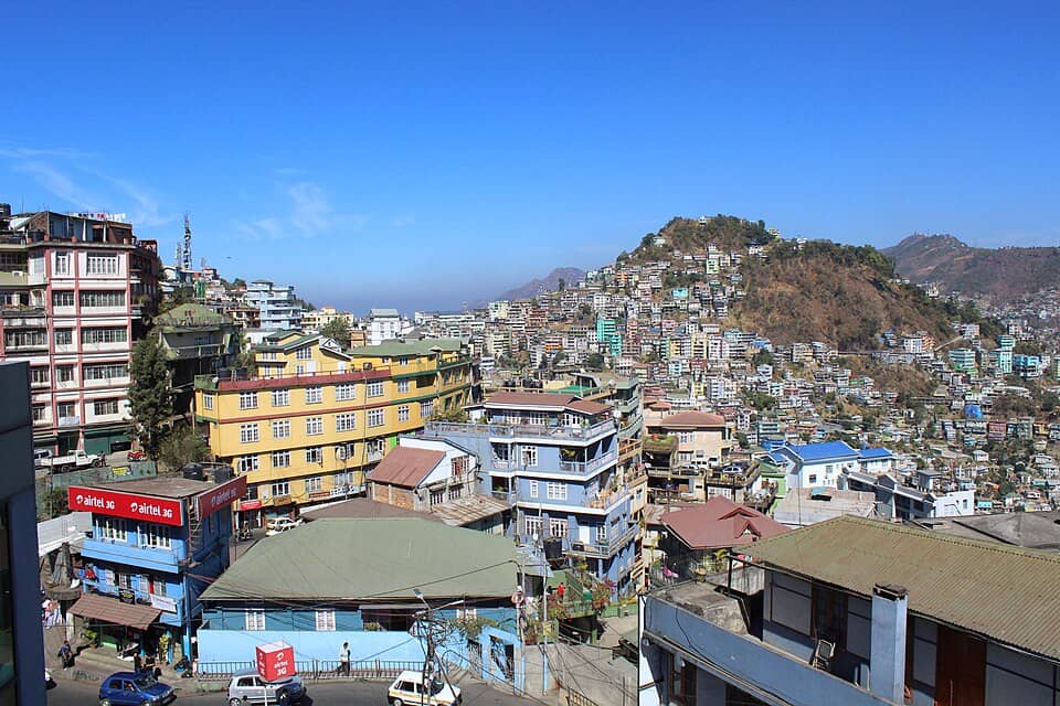 Terraced homes and winding lanes glowing softly under the morning light. Image Courtesy: Wikkimedia Commons