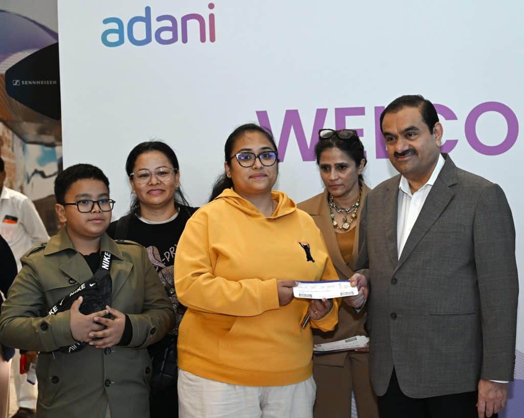 Chairman Gautam Adani Welcomes First Passengers as Navi Mumbai International Airport (NMIA) Takes Flight