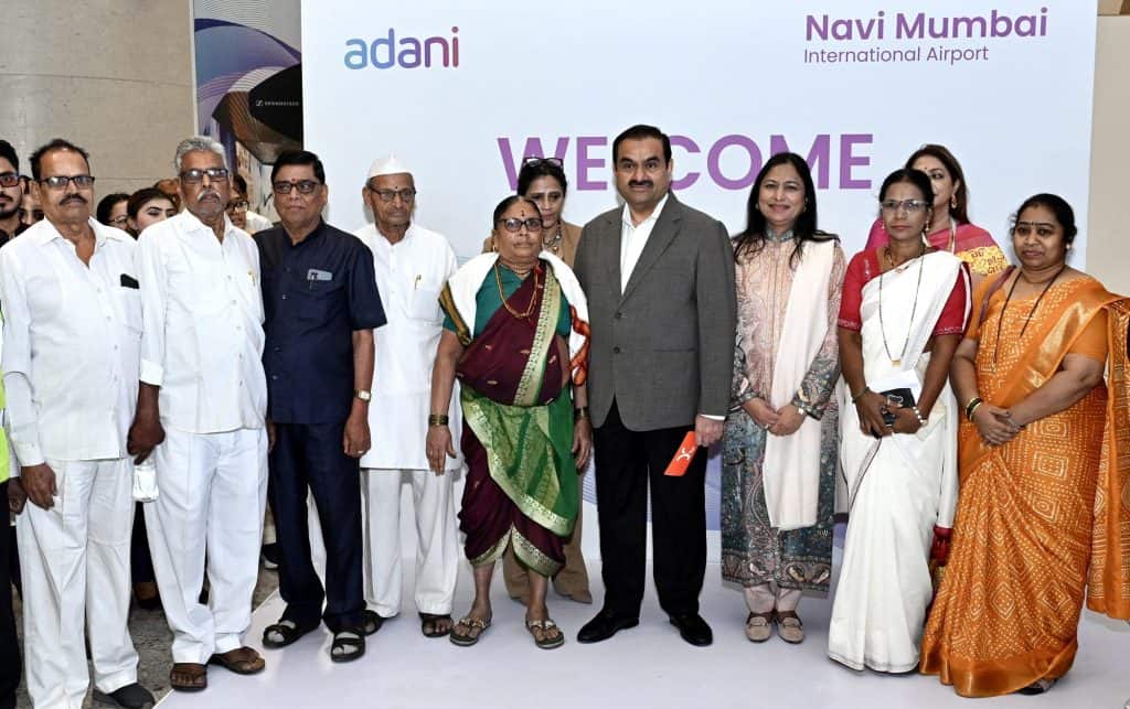Chairman Gautam Adani Welcomes First Passengers as Navi Mumbai International Airport (NMIA) Takes Flight
