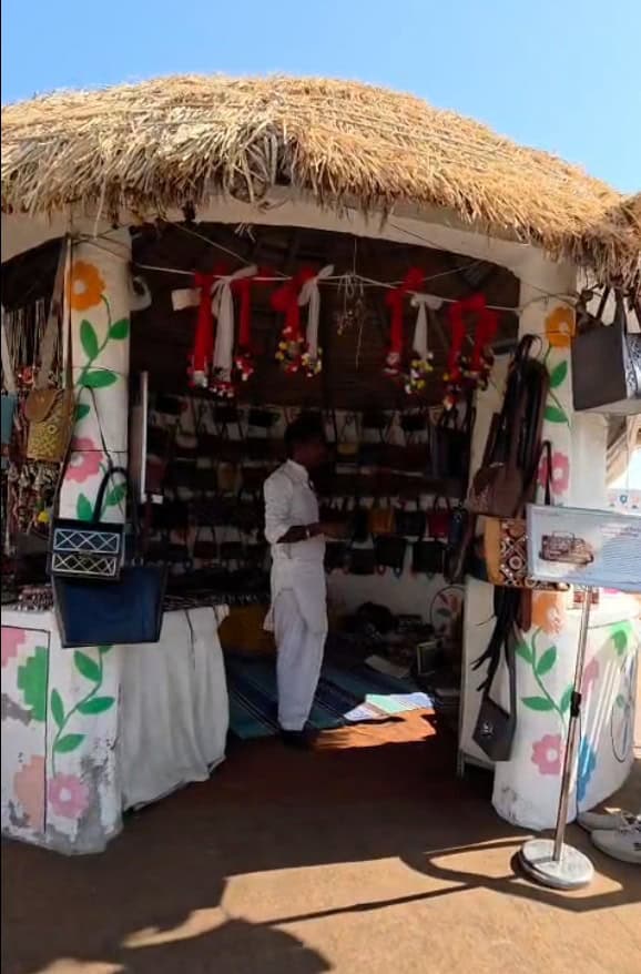 A traditional Kutchi stall showcasing local crafts and leatherwork.