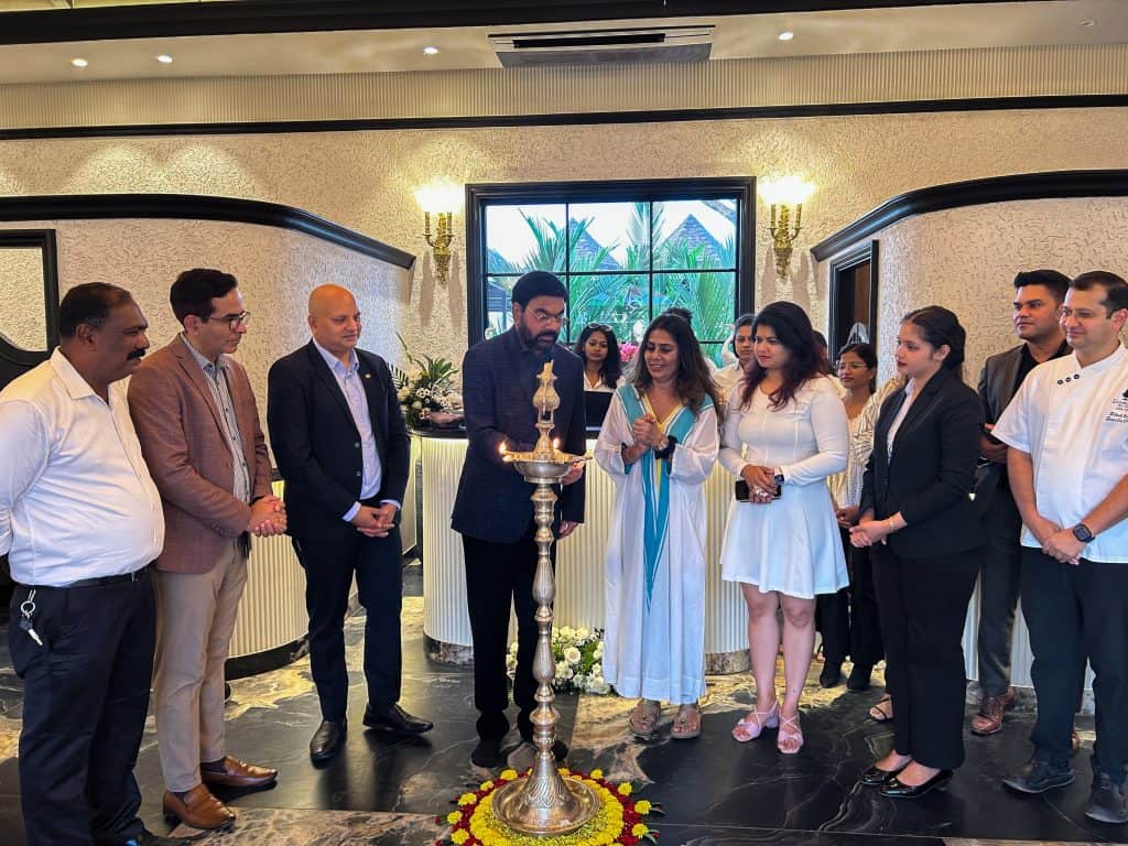 Chairman of the MRG Group Dr. K. Prakash Shetty (fourth from left) lighting the lamp at the inaugural ceremony marking the launch of The Riverfront, in Panaji, recently. Also seen is the MRG team and The Riverfront staff